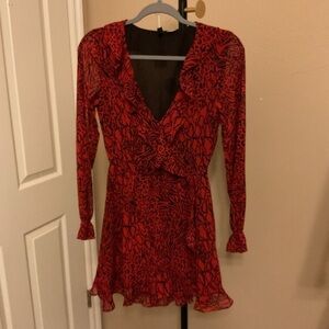 H&M Fit and flare Mini dress with long sleeves and ruffles. Size. 2